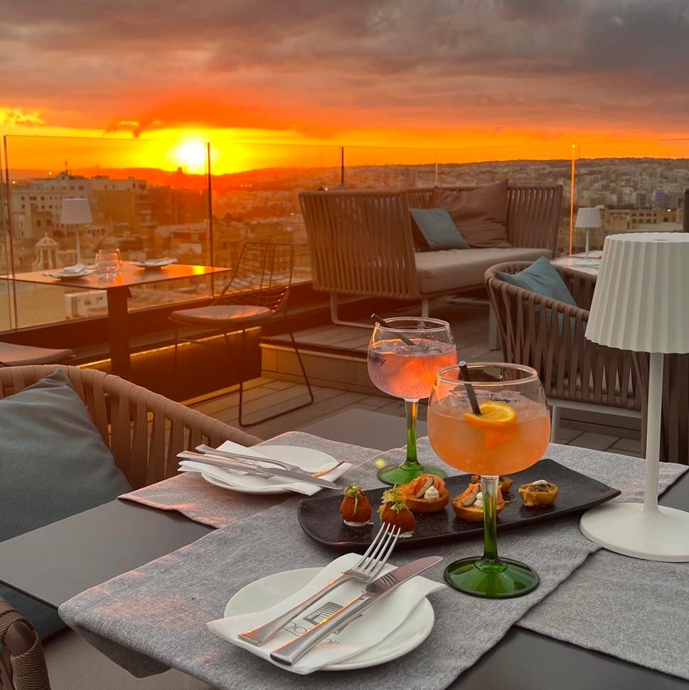 Sunset Rooftop Dining — Karen